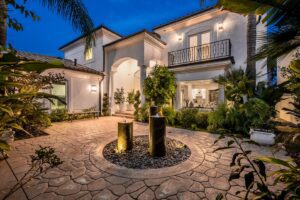 modern-house-with-a-front-yard-fountain-illuminate