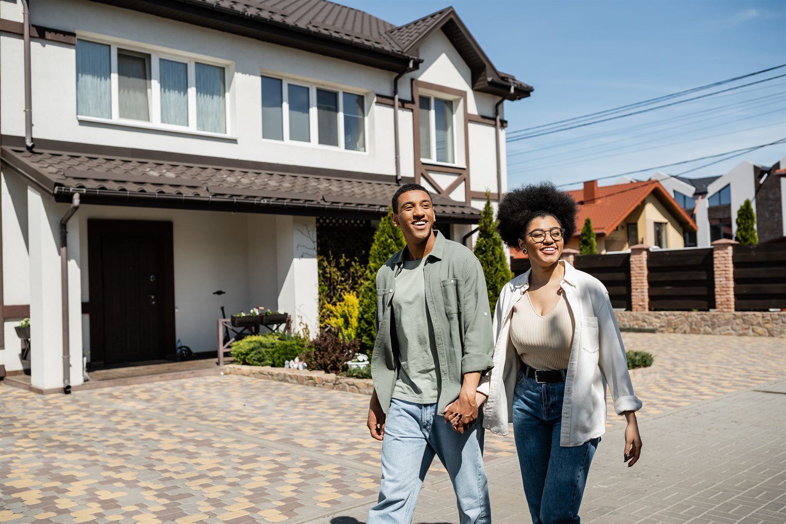 smiling-african-american-couple-holding-hands