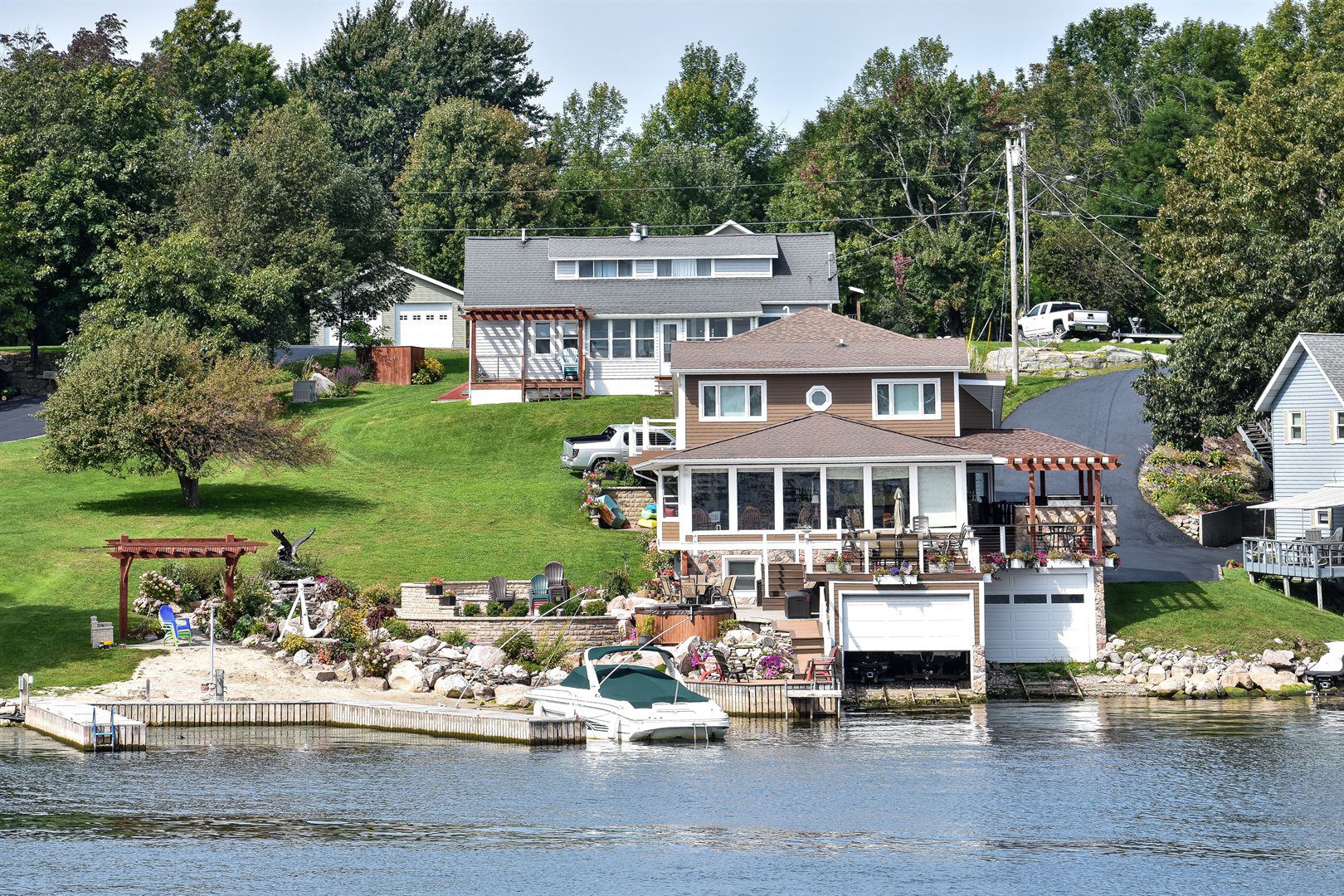 lot-of-different-buildings-in-a-grassy-area-on-the-lake