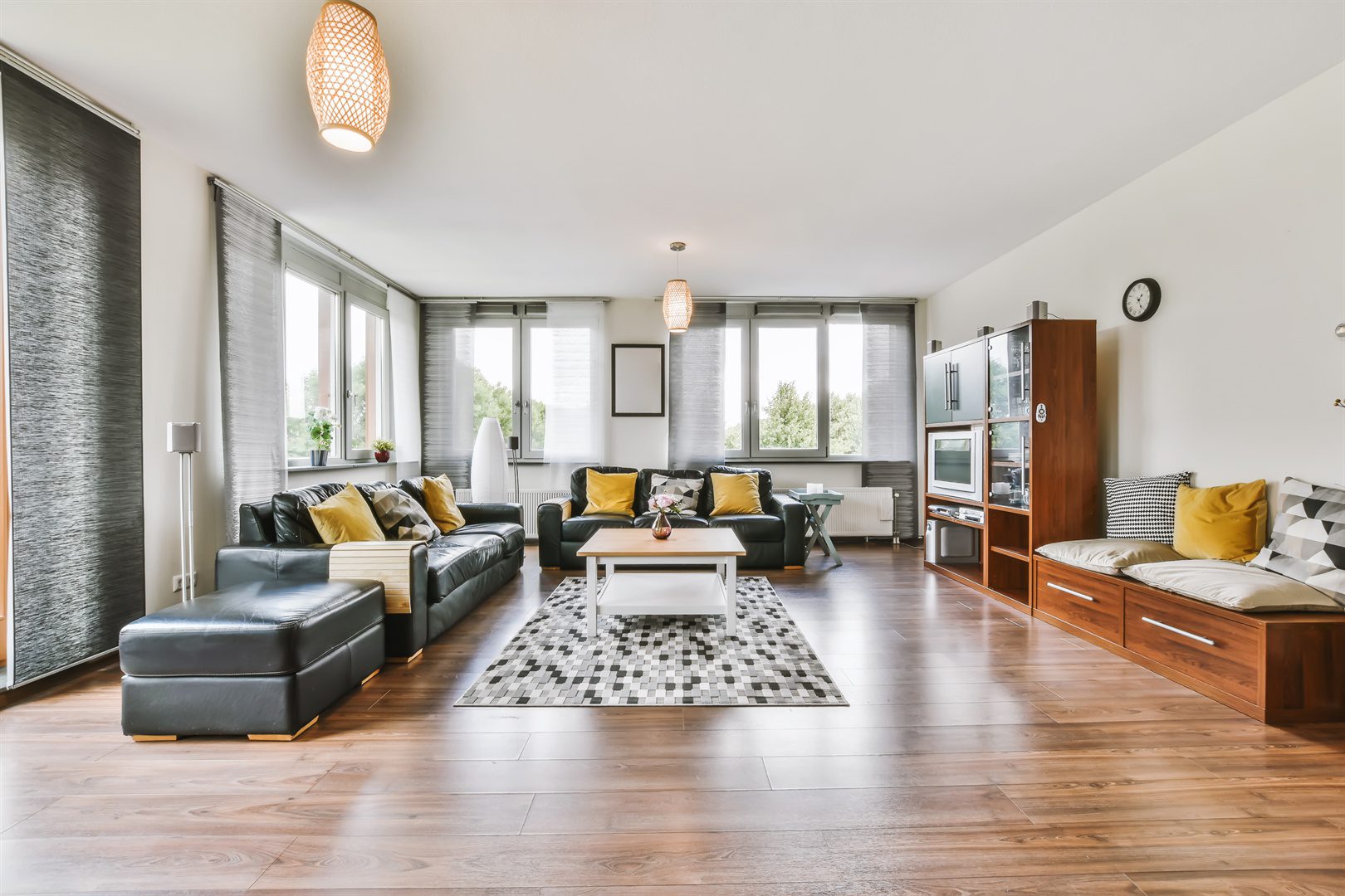 lovely-living-room-with-black-sofa