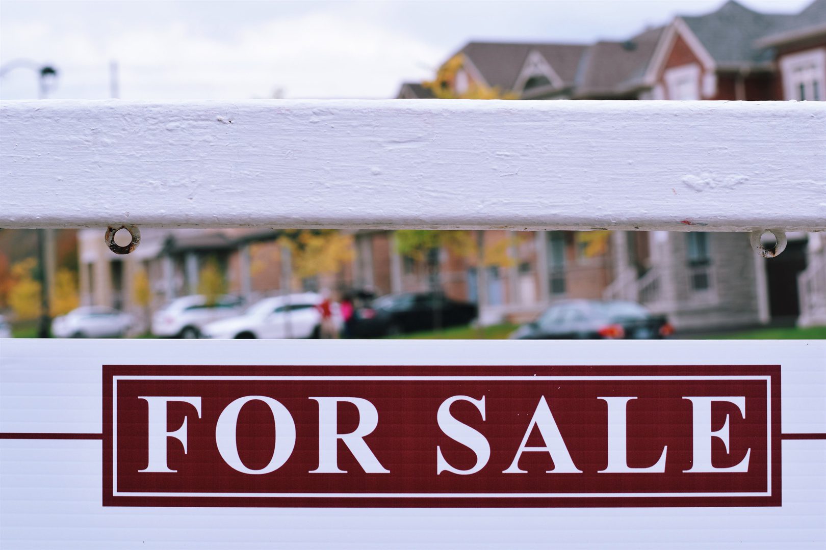 house-for-sale-sign-on-a-street-in-a-residential